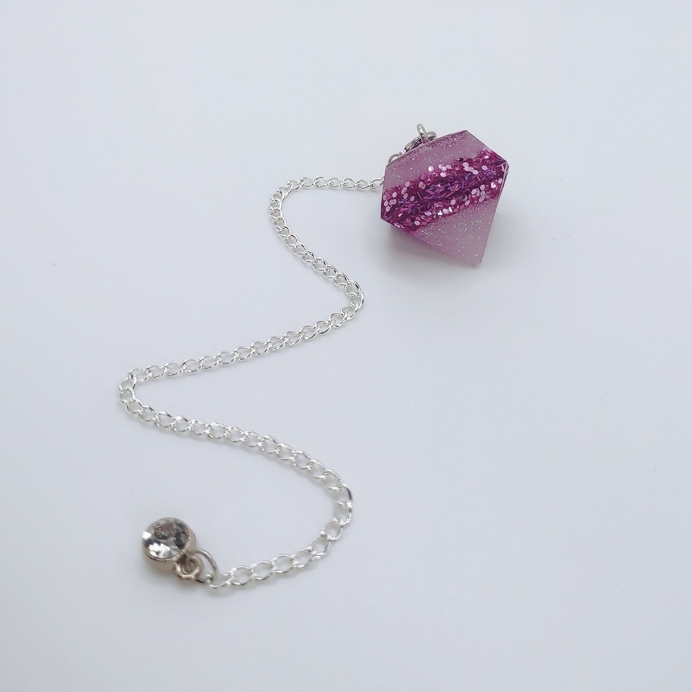 Raspberry and soft pink glittery handcrafted resin dowsing pendulum